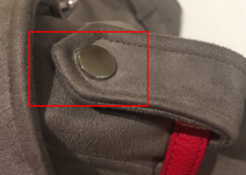 A e dini se për çfarë shërben butoni mbi shpatull tek palltot